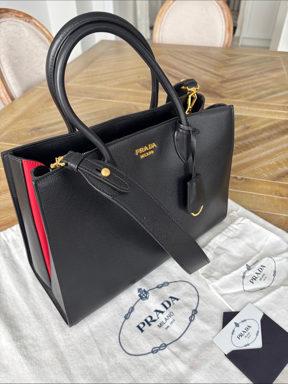 Prada Saffiano Black Leather Tote with Red Trim